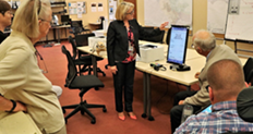 Lynda Roberts showing the Election Advisory Committee, Marin County's new accessible ballot marking device